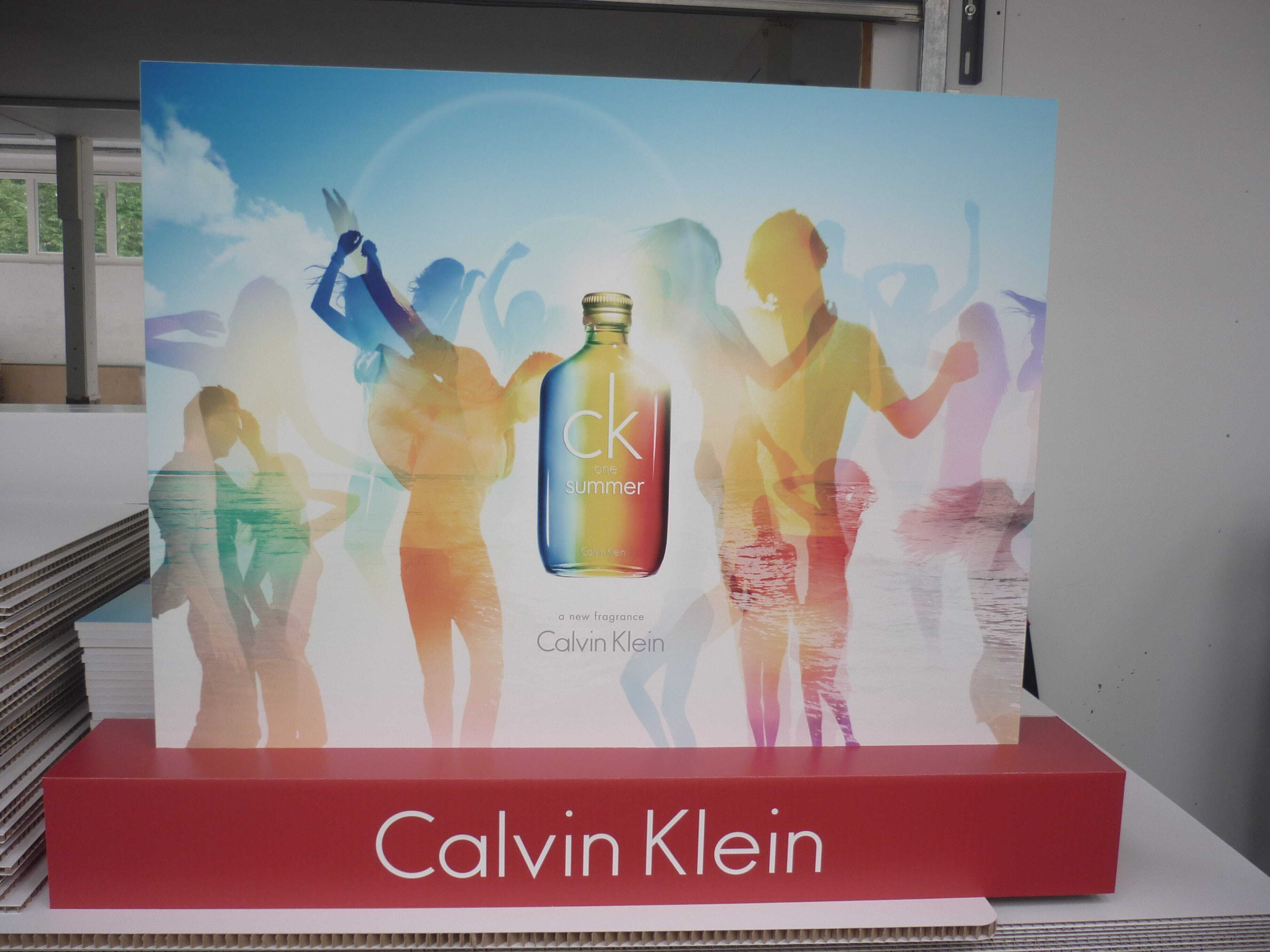 A Calvin Klein fragrance display showcasing different fragrance display ideas.