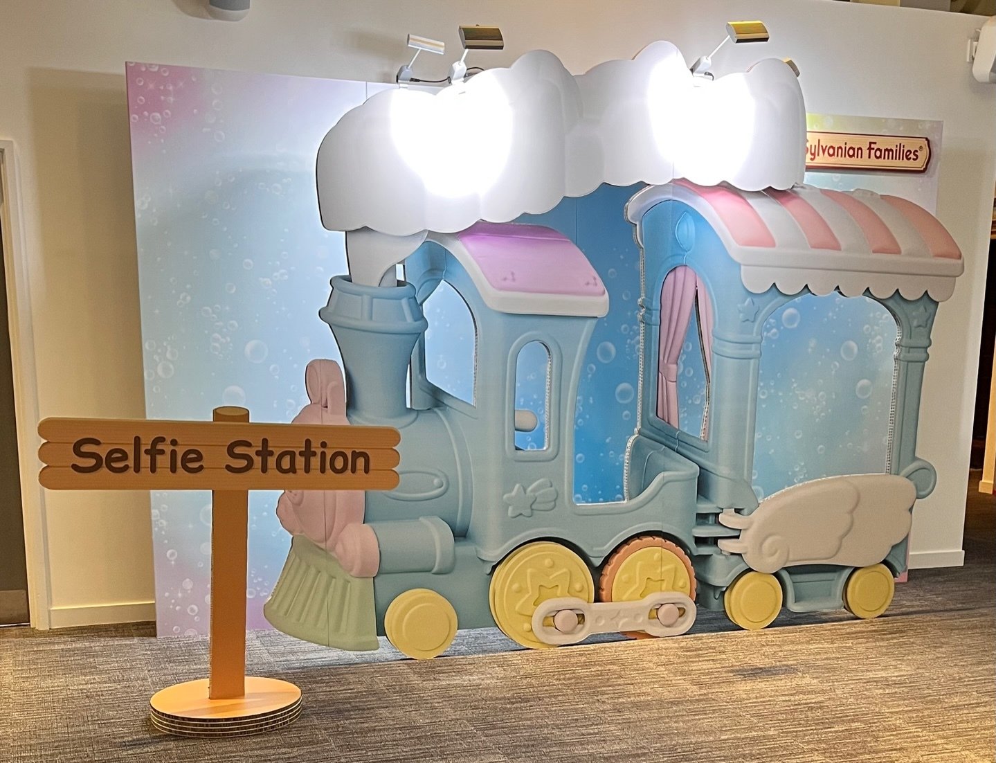 A selfie station and train display which has been made from different types of cardboard for an impactful display.